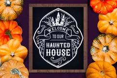 welcome to our haunted house white on black