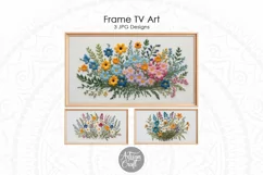 Frame TV art shows depiction of hand embroidered wildflowers on white canvas.