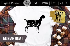 Goat Silhouette with Wildflowers inside shown on farm style plaid shirt