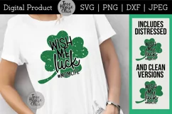 Wish Me Luck Momlife St Patricks Day Mom quote shown.  Text on a distressed clover shape design, shown on a womens white shirt
