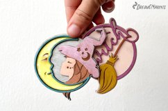 Witch ornament for laser cutting machines featuring the moon and a witch.