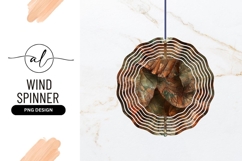 Round wind spinner with leaf design png Product Image 1