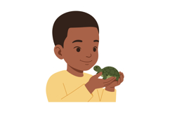 Young boy joyfully holding a small green turtle in a flat ve Product Image 1