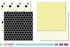 Yellow and black scrapbook paper with honeycomb and dot patterns