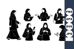 Muslim woman wearing hijab using smartphone and walking in d Product Image 1