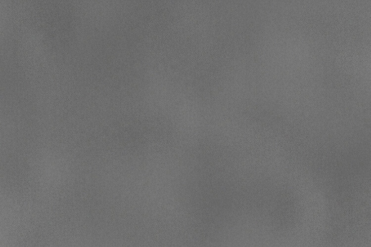 A textured gray surface with subtle pattern details