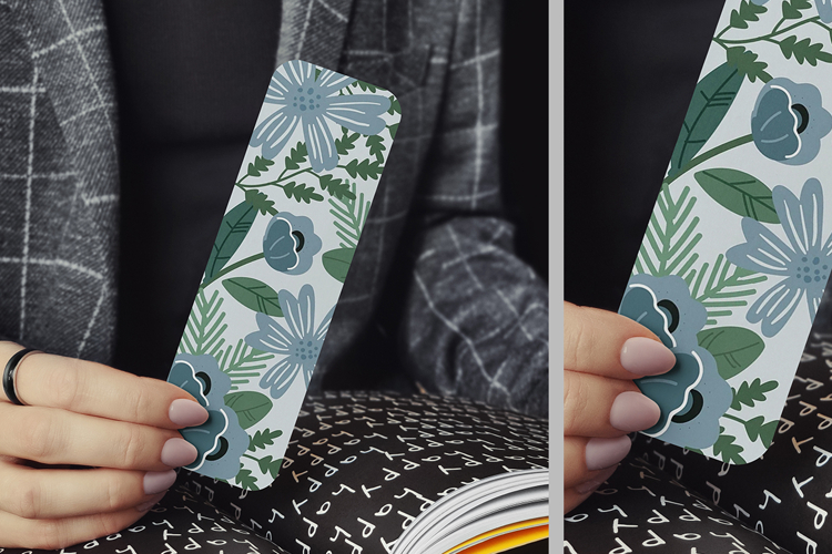 Woman Holding a Bookmark with Rounded Corners Mockup