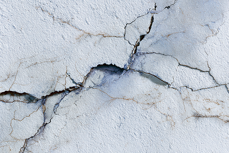 White Marble Texture with Dramatic Blue and Tan Fissures