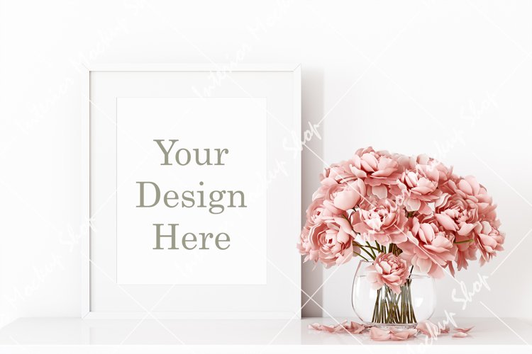 White frame mockup and pink flowers