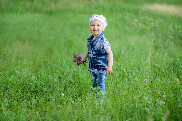 Cute baby girl on a walk in the Park