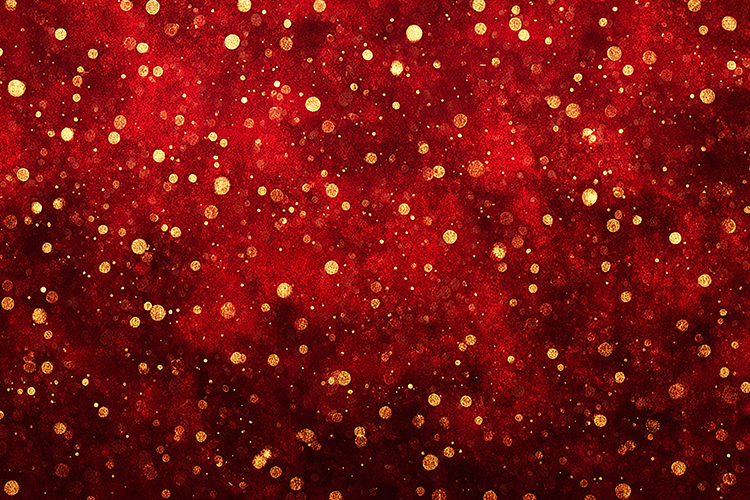 A vibrant red background with scattered golden glitter dots