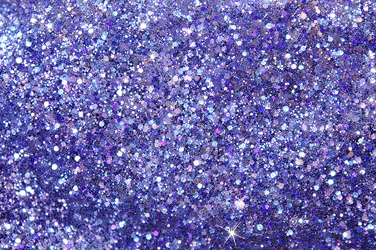 Purple glitter background with sparkling white &blue specks