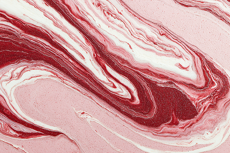 A vibrant abstract art piece featuring swirling red & white