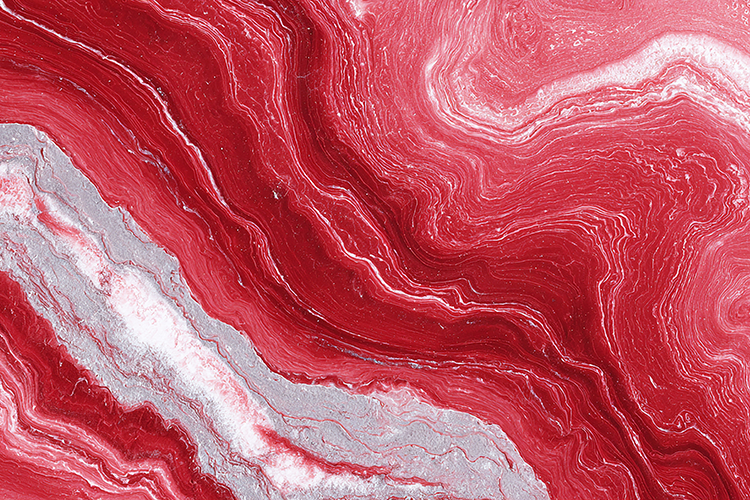 A vibrant red and white marbled abstract background texture
