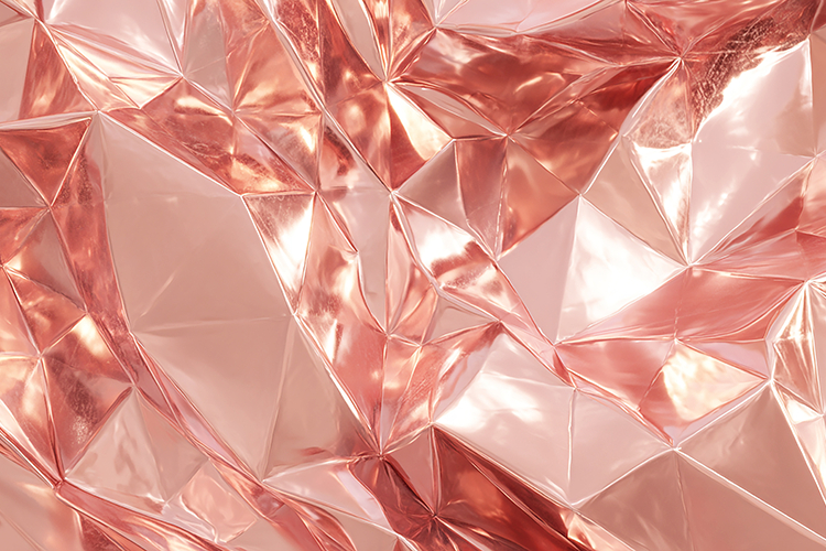 Shiny, rose-gold, geometric patterned surface