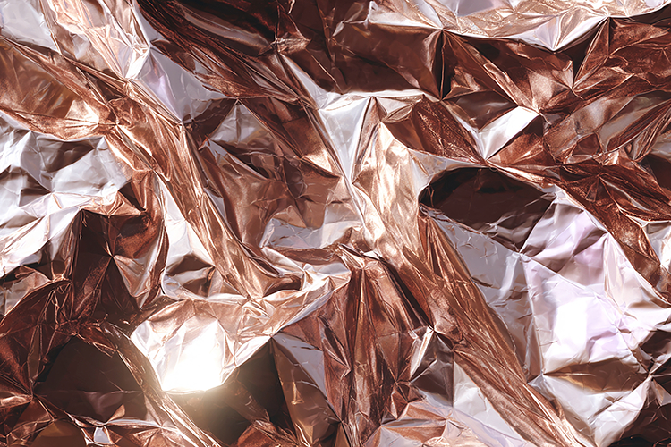 Crumpled metallic foil with reflective surfaces