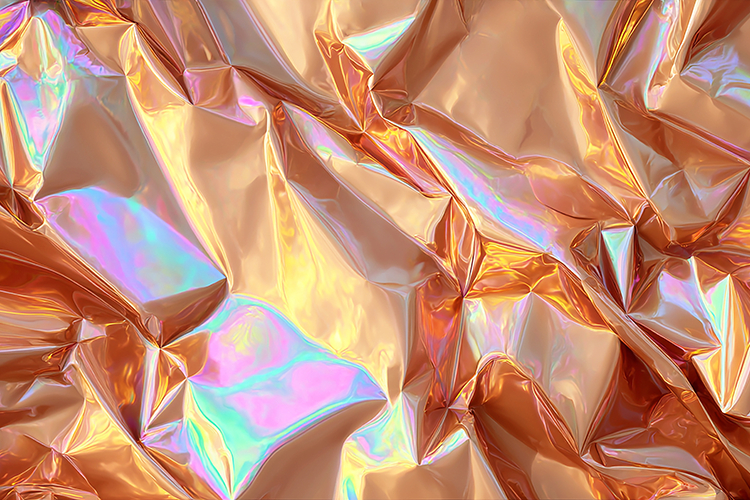 Crumpled piece of iridescent foil with shimmering colors