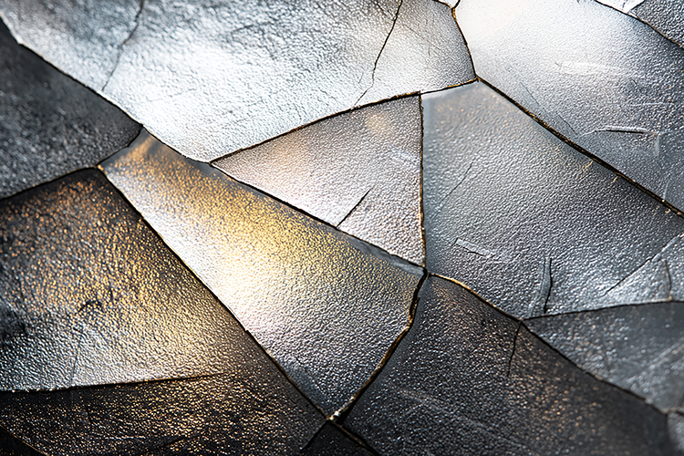 A metallic surface with geometric shapes   reflective light