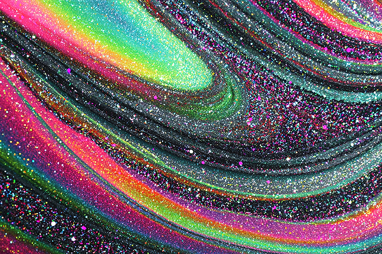 Swirling rainbow patterns and glittery texture