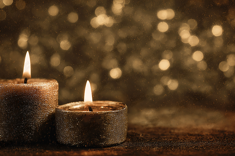 Hanging Red Glitter Christmas Ornament and Bokeh Lights