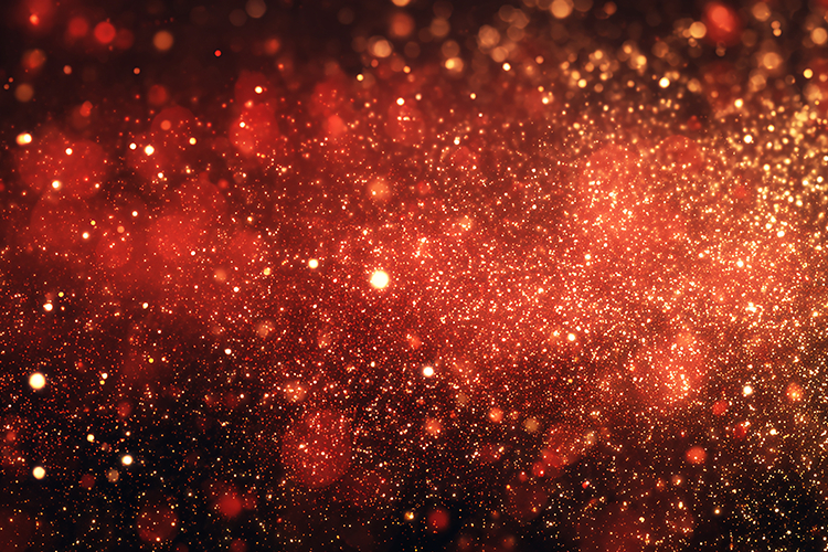 A vibrant and dramatic with sparkling red and gold particles