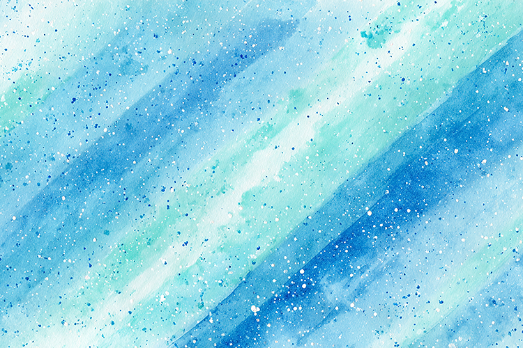 White streaks and specks of glitter on a canvas