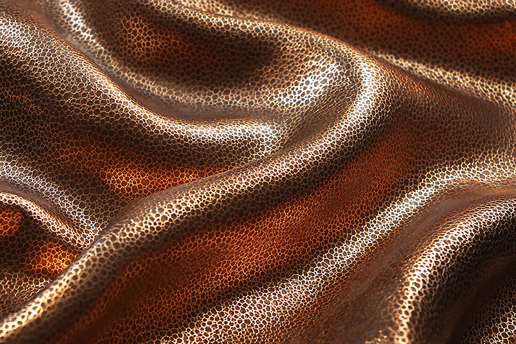 A luxurious brown leather with smooth folds and texture