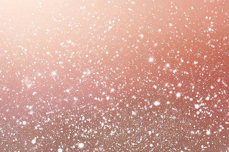 A beautiful pink glitter background with white sparkles