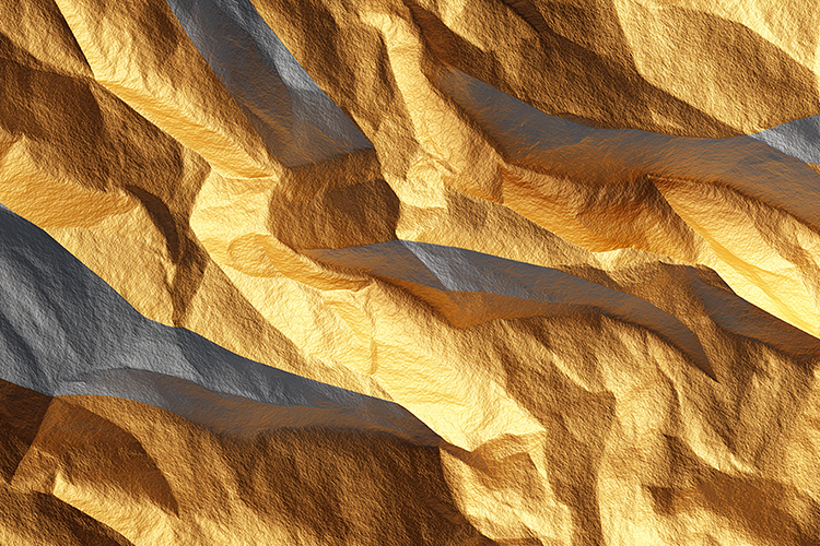 A textured, golden surface with gray shadows