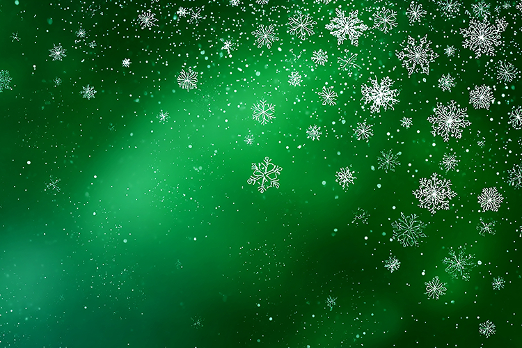 A vibrant green background with falling snowflakes