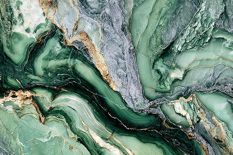 A green marble texture with gold accents