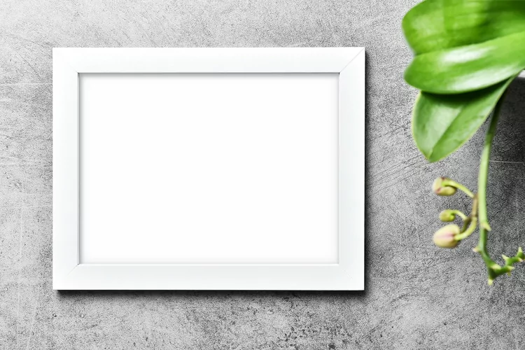 Frame mockup with floral decoration stock photo