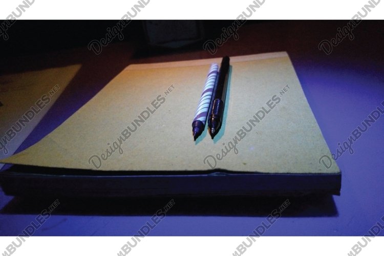 Two stationery and one book example image 1