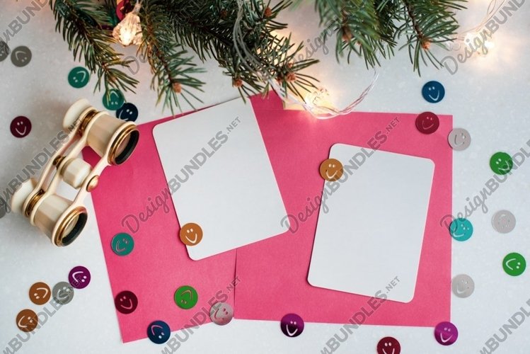 Christmas card with opera glasses, lights, copy space. example image 1