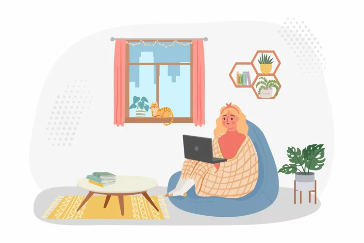 Work from home, woman in chair with laptop