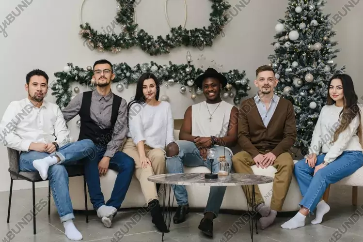 A multinational friendly company poses for a photo