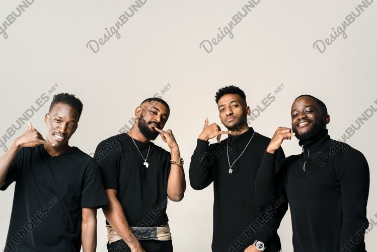 Arab, african and african american men showing phone gesture