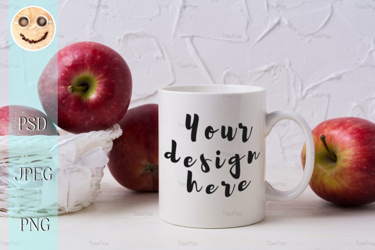 White coffee mug mockup with red apples in wicker basket example image 1