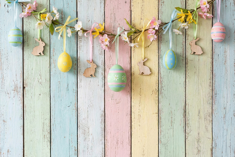 Colorful Easter Eggs on Wooden Background