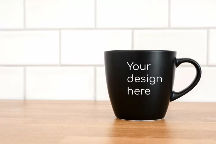 Black matte mug in the kitchen with space for text. JPG PSD