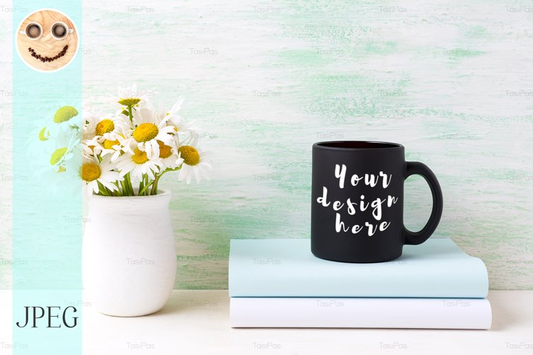 Black coffee mug mockup with white field chamomile bouquet example image 1