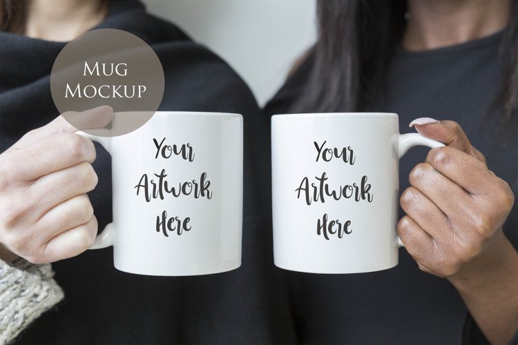 Two women holding mugs example image 1