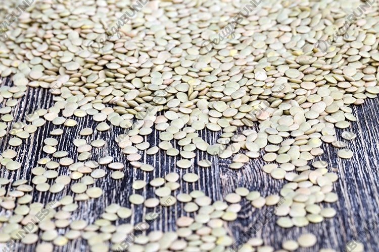 a large amount of raw lentil grains example image 1