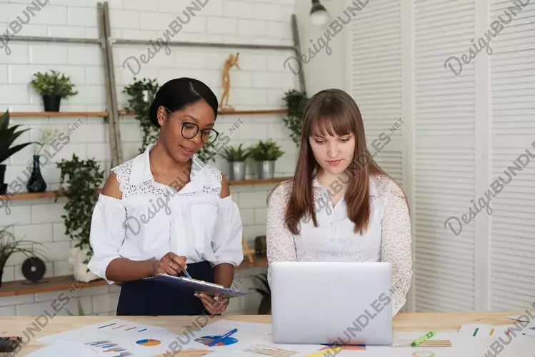 JPG photo- Close up of multiracial colleagues talking