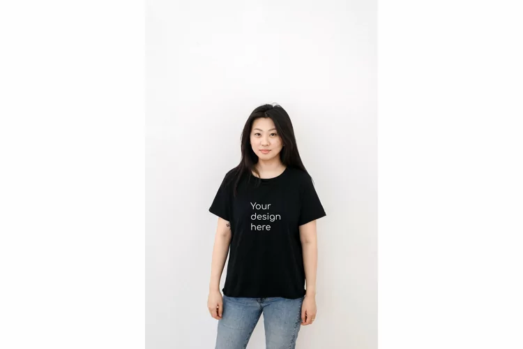 Asian woman in a black t shirt on a white background