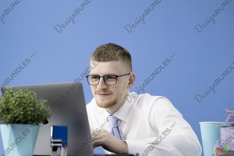 Handsome man dressed in classic shirt with blue tie example image 1