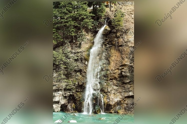 Vertical shot of the mountains covered in snow example image 1