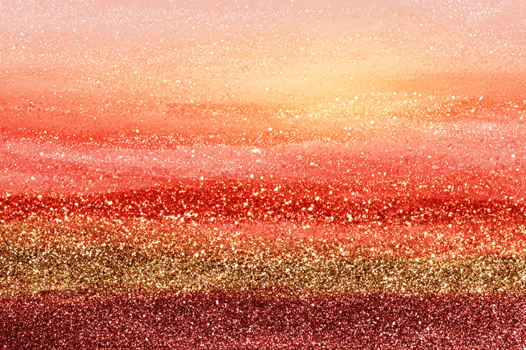 Sunset background with glittering texture and warm hues