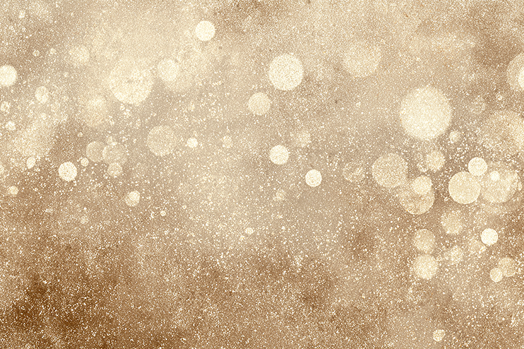 White bokeh lights on a brown gradient