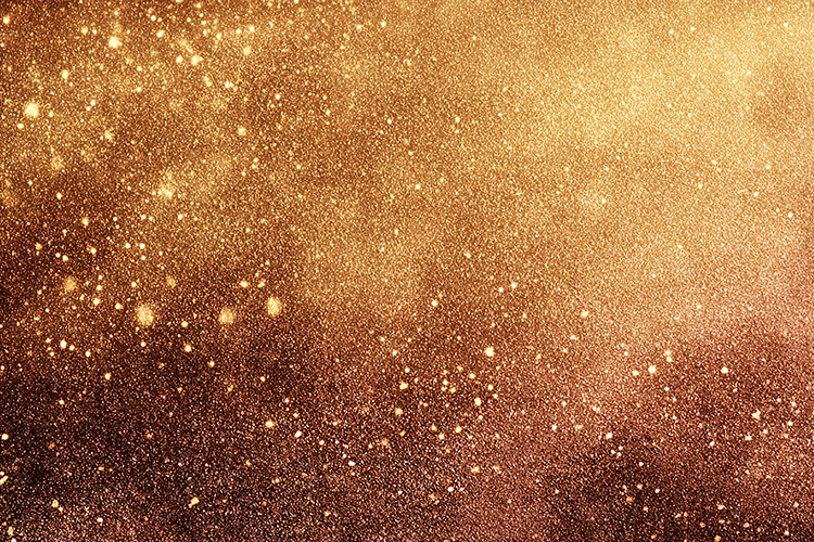 Golden glitter background with sparkling particles